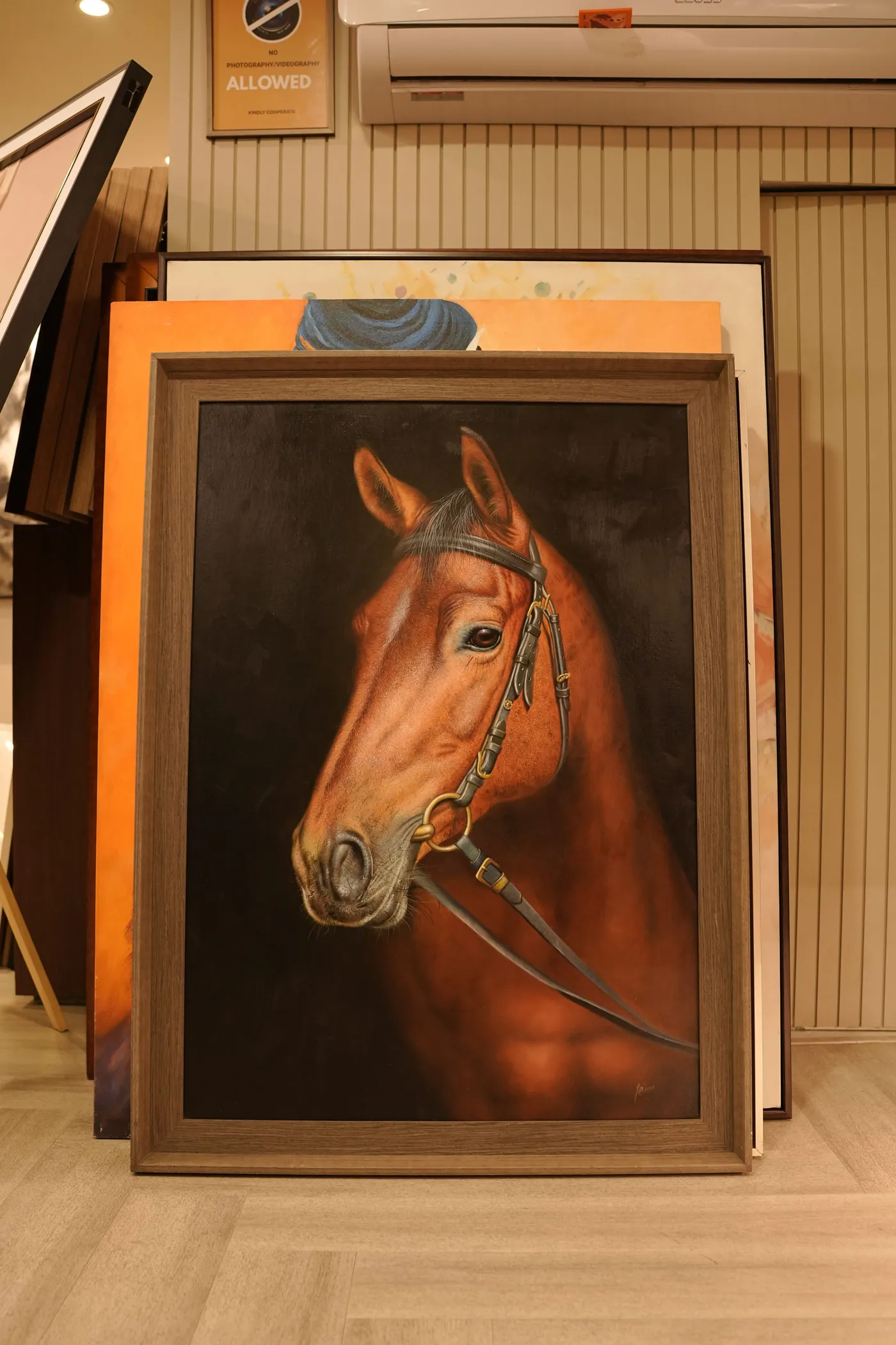 Equestrian portrait in a broad walnut frame