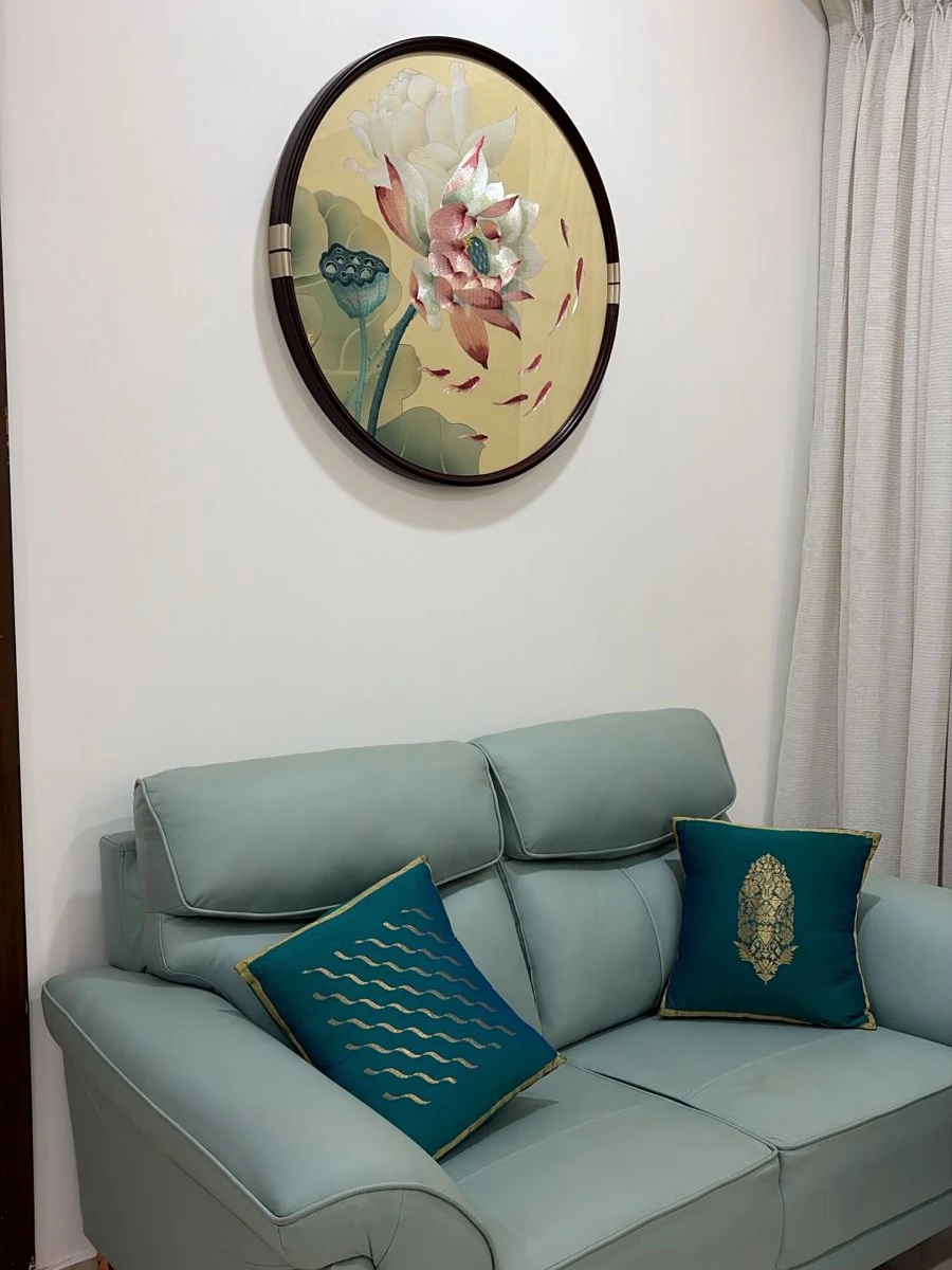 A round lotus panel above a sofa